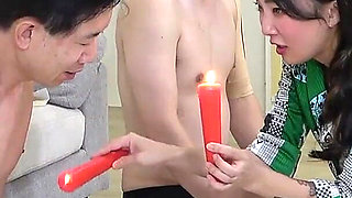 Hot Wax Endurance Battle, Mistress Drips Hot Wax Onto Two Masochists and Makes Compete to See Who Can Withstand Heat Longest