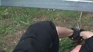 Humiliates stretching bottle in ass