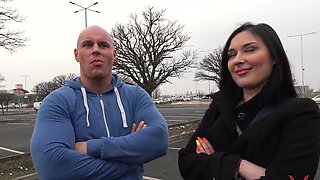 Brunette Nika gives a steamy blowjob in the car while her man fucks her from behind