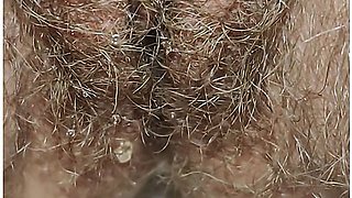 Best close-up of peeing on a thick, hairy pussy