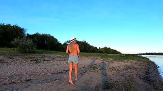 Russian Nudist on the River Shore