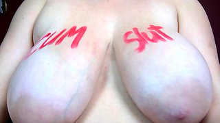 Blonde mature with big boobs masturbates in bed