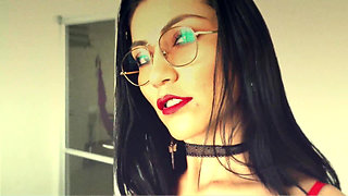 Latina with a Sensual Body Posing in Her Latex Skirt