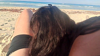 MILF Sucks Cock and Swallows Cum on the Beach POV