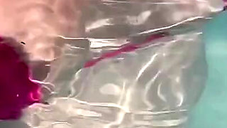 Artemisia Love Sexy and Horny Underwater Showing Her Big Tits in a Super Micro Bikini and You Can See Her Aureolas…
