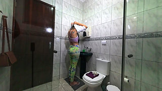 Maid changing clothes in the bathroom.