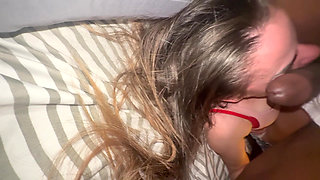 Brunette loving daddy's dick over her face