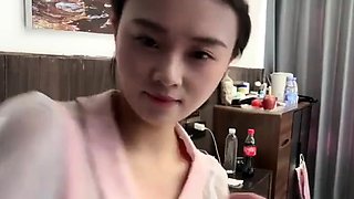 Horny Japanese teen in school uniform sucks cock