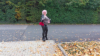 Naughty Granny Tongue Out Flashing Big Tits in Public