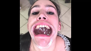 French Maid Tries to Swallow Her Own Piss Through Lip Retractor