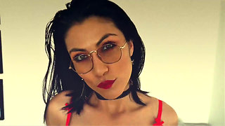 Latina with a Sensual Body Posing in Her Latex Skirt