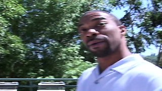 Big tit ebony MILF sucks a big cock outdoors