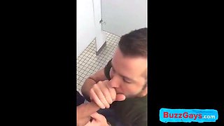 Hunk gives blowjob in a public restroom - amateur gay porn