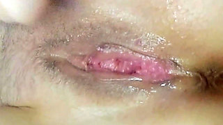 Playing with an Oiled Pussy Close-up