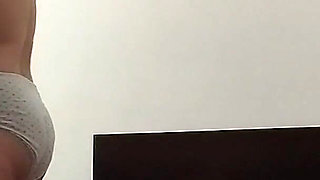 Amateur Woman Has Fun Trying on Clothes and Cutting Them.
