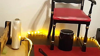 Busty Dominatrix Drenches Bound Slave in Sloppy Golden Shower