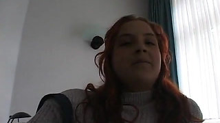 Hairy redhead bbw fingers her pussy on the bed