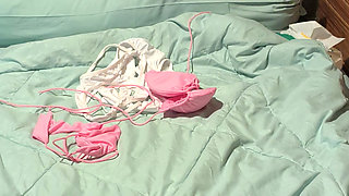 My Indonesian wife is trying on her new bikinis.