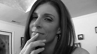 Brunette milf enjoys a black monster cock