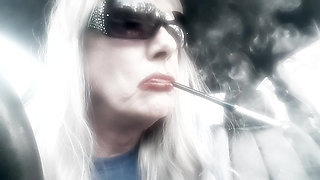 DOMMIE MOMMY SMOKING LONG CIGARETTES IN A HOLDER
