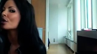 Smoking Hot Brunette Milf in Latex Catsuit and Boots