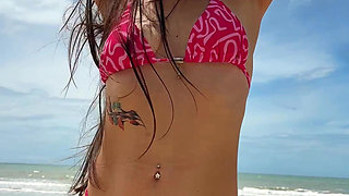 Pink Bikini and Hot Beauty Pleasure on the Beach