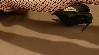 Ballbusting in fishnet stockings