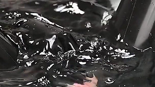 Latexdoll in the Bathtub