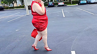 Beautiful Woman Walking Outdoors in Parking Lot Showing off for Strangers