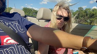 Truck driver enjoys the stunning view of a hot ash-blonde babe squirting in a convertible BMW