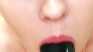 Black Dildo Blowjob