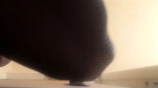 High-Heeled Milf Sucks and Fucks in a Catsuit at a Gloryhole
