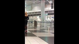 As a Sissi slut at Munich Airport on the road in full travel traffic