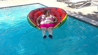 Short Video of BBW Nurse Vicki Floating on Her Huge Watermelon