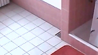Amateur blonde masturbates on toilet