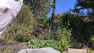 Teenage stepdaughter taking a facial from the gardener in