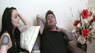 Tattooed Brunette Gets Fingered on the Couch and Cums Hard