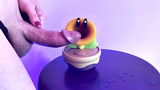 Hot Glue Covering Toy Figure in Cum