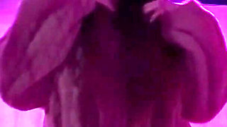 Smoking a Cigarette Outdoor While Wearing Only a Bikini and a Jacket