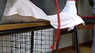He Hung up His Girlfriend's Bare Feet and Cuffed Her Toes with His Thumbs