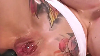 MILF with Oiled Monsterboobs Stretching Her Tight Holes