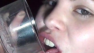 Horny Teen Drinks Glass of Cum Loads