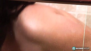 Awesome BBW brunette Milly Marks shows off her gigantic melons