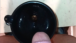 Pissing in A Bottle with The Aide of A Funnel