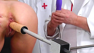 Rectal speculum exam and machine orgasm of hot MILF