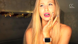 a romantic setting and a blonde spreading her legs