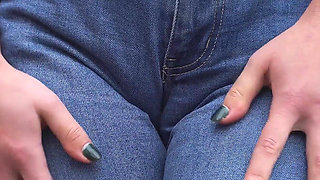 MILF Teasing Her Big Cameltoe in Blue Jeans Outdoors