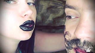Covering Alex with black shiny lipstick kisses all over his face!