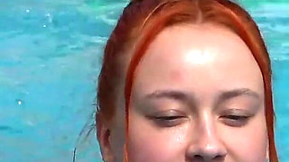 Two Lesbians Have Fun in Outdoor Pool with Happy Ending for Both!