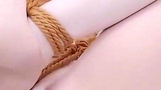 Pink Jk Girl's Turtle Shell Is Tied up in Multiple Bundles